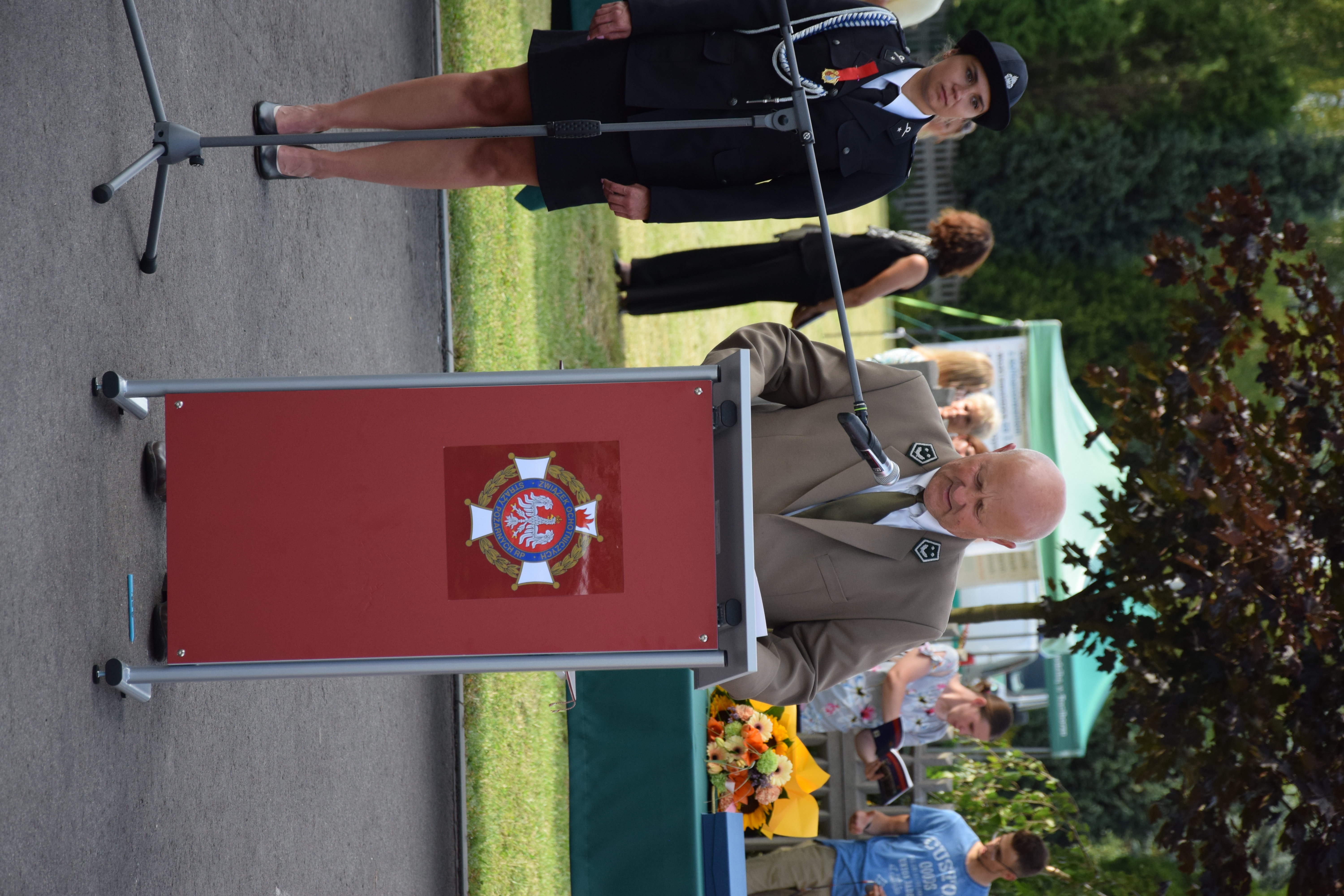 Zdjęcie przedstawia uczestników Jubileuszu 100-lecia OSP Toporowice